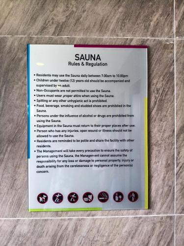 a sign on the floor with some chocolates at Peace home apex in Cyberjaya