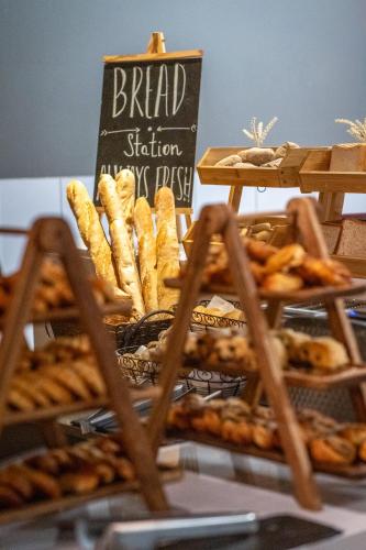 a basket of breads and pretzels on a display at DoubleTree by Hilton Santiago Kennedy, Chile in Santiago