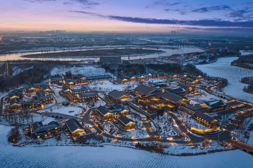 an aerial view of a resort in the snow at Homm Changchun Beihu in Changchun