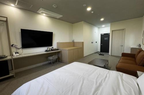 Телевизор и/или развлекательный центр в Centum Hotel Mokpo Namak branch