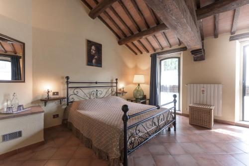 Postel nebo postele na pokoji v ubytování Agriturismo Colli di Travale
