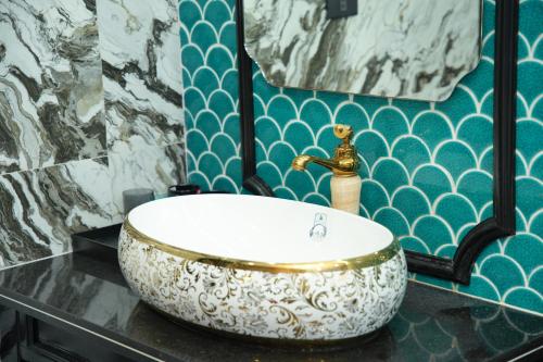 a bathroom with a bowl sink on a counter at Happy Tam Coc Ecolodge in Ninh Binh