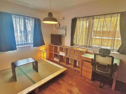 Televisyen dan/atau pusat hiburan di A t a shinchi share house