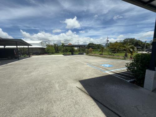 a large parking lot with a basketball court at Really good home in Taitung City