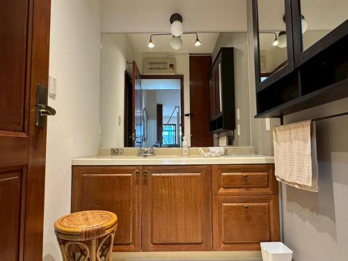 a bathroom with a sink and a mirror at and CITY三軒茶屋 in Tokyo