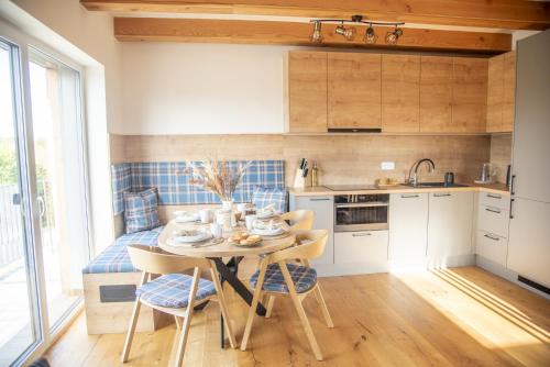 Kuchyň nebo kuchyňský kout v ubytování Nora Apartments