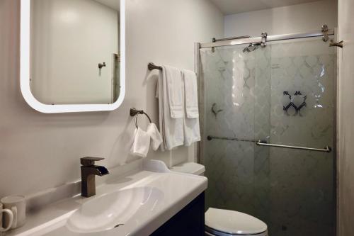 a bathroom with a sink and a shower at Oaktown Roost in Oakland