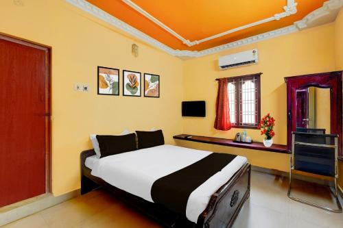 Postel nebo postele na pokoji v ubytování Super Hotel O Nemeli Road Sriram Nagar