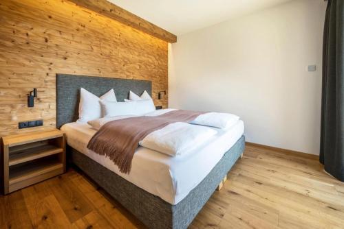 Ein Bett oder Betten in einem Zimmer der Unterkunft MULIN Appartements