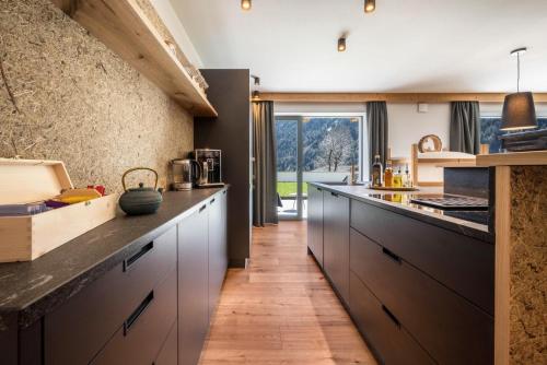 Küche/Küchenzeile in der Unterkunft MULIN Appartements