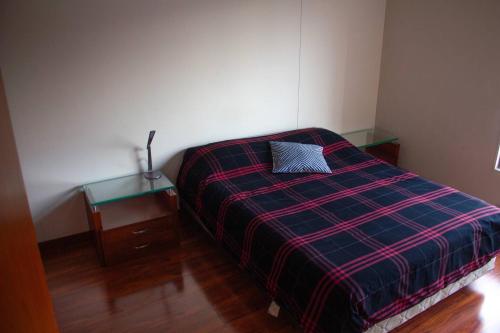 Postel nebo postele na pokoji v ubytování Habitación Doble Ciudad Salitre