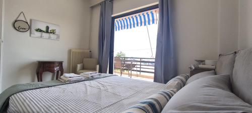 Postel nebo postele na pokoji v ubytování Beachfront vision 1