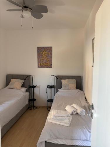 Katil atau katil-katil dalam bilik di Apartman LANA