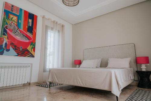 Ένα ή περισσότερα κρεβάτια σε δωμάτιο στο Dar Lily-Luxury & Design 4BDR Villa with Pool in Hammamet-5mn to Beach, The sindbad hotel
