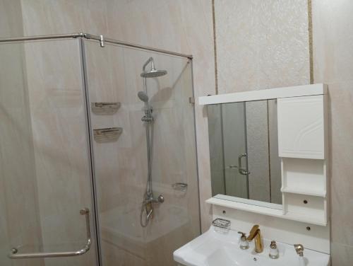 Koupelna v ubytování Siyoma Hotel