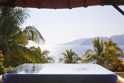 a view of the ocean from a resort balcony at Thompson Zihuatanejo, A Beach Resort, by Hyatt in Zihuatanejo