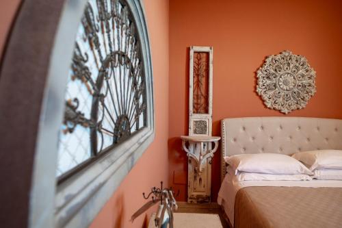 Un ou plusieurs lits dans un hébergement de l'établissement Panorama Suites Noto - Adults Only
