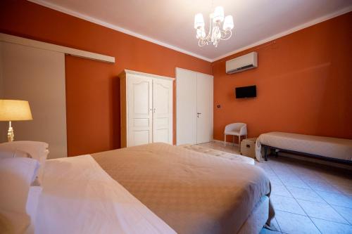 Un ou plusieurs lits dans un hébergement de l'établissement Panorama Suites Noto - Adults Only