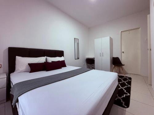 Postel nebo postele na pokoji v ubytování Private Room Ipoh Centre - Stay with host