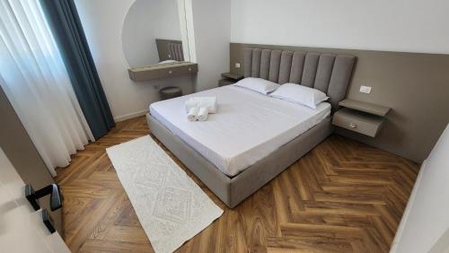 Katil atau katil-katil dalam bilik di Blue sand apartments
