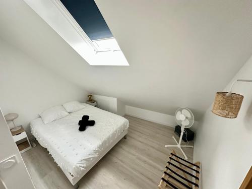 Postel nebo postele na pokoji v ubytování Le Duplex Appartement