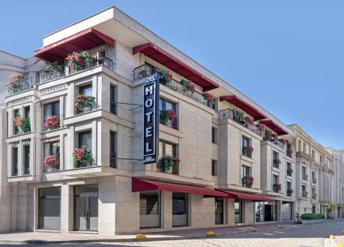 a building with a sign on the side of it at Lenus Hagia Sophia Hotel in Istanbul
