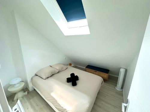 Postel nebo postele na pokoji v ubytování Le Duplex Appartement