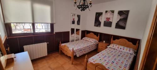 Ένα ή περισσότερα κρεβάτια σε δωμάτιο στο Casa Majacielos