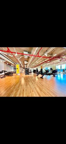 a bowling alley with a wooden floor in a building at Downtown Views 2 - Burj Khalifa View in Dubai