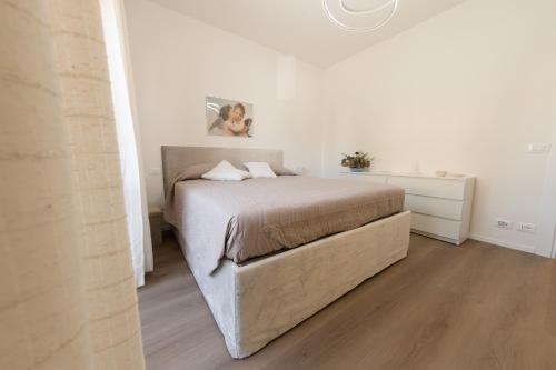 Postel nebo postele na pokoji v ubytování Luana - Key4Guest