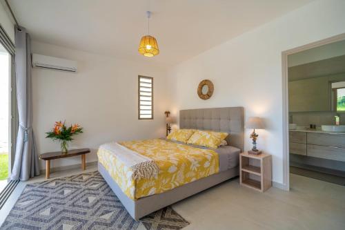 Ένα ή περισσότερα κρεβάτια σε δωμάτιο στο Villa Dolce Vita avec concierge