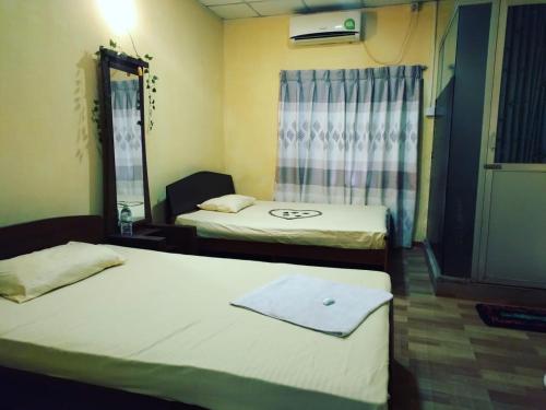 Postel nebo postele na pokoji v ubytování Walawwa Resort