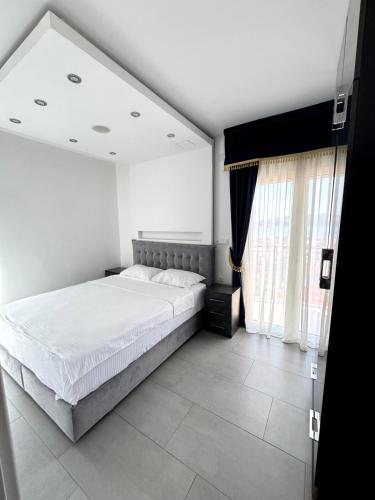 Cama o camas de una habitación en Eden apartments