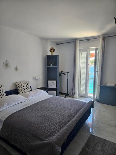 Posteľ alebo postele v izbe v ubytovaní Lastovo Holidays