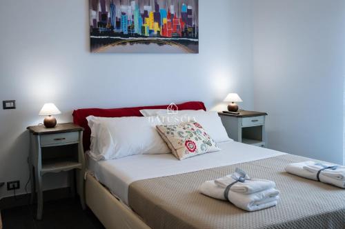 Postel nebo postele na pokoji v ubytování Natuscia Trevignano Platani Villa with Garden