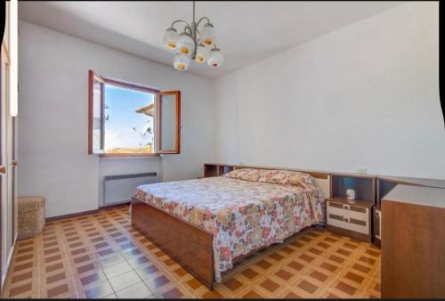 Ένα ή περισσότερα κρεβάτια σε δωμάτιο στο Casa l'Ogliera