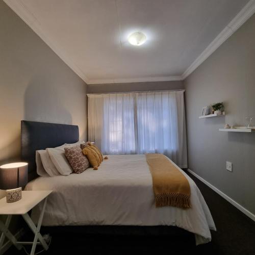Una cama o camas en una habitación de Kruin suite