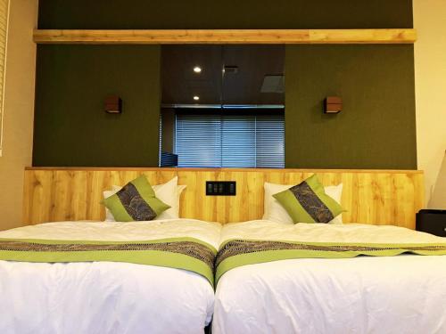 Katil atau katil-katil dalam bilik di Livemax Resort Sanuki Shionoe Onsen