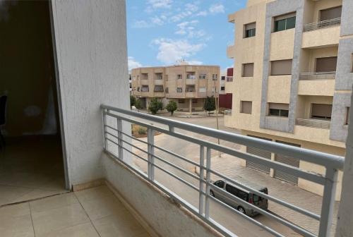 a balcony with a view of a building at Appart Hotel Fes - Joud Families & Travelers in Fès