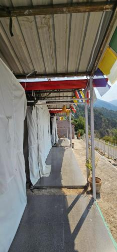 an inside view of a building with a roof at TMS Resort in Sari