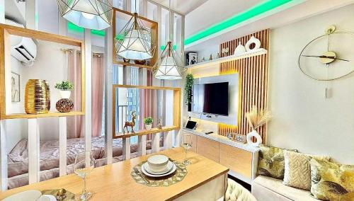a living room with a couch and a table at The Horizons Place in Lapu Lapu City