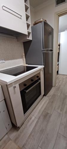 Una cocina o zona de cocina en Alloggio Solarium