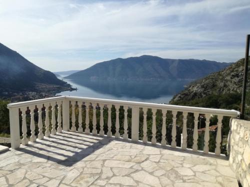 a balcony with a view of a lake at Villa Smokovac in Risan