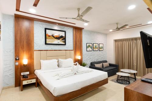 Postel nebo postele na pokoji v ubytování Visava Amusement Park & Resort Navi Mumbai