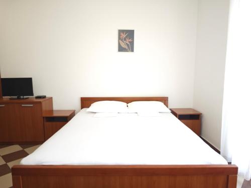 Postel nebo postele na pokoji v ubytování Guest House Anika