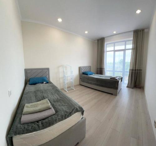 Postel nebo postele na pokoji v ubytování Daimond Resort