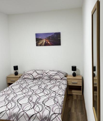 Postel nebo postele na pokoji v ubytování Apartmani Popivoda