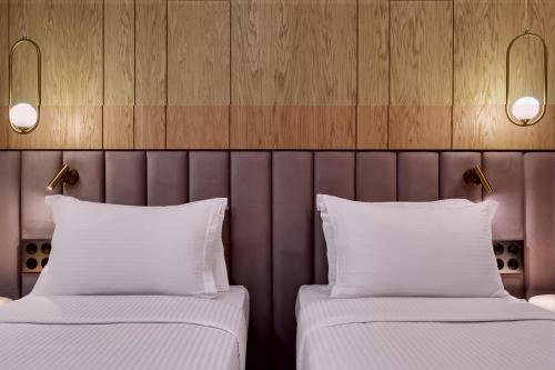 Cama o camas de una habitación en Hilton Garden Inn Athens Syggrou Avenue