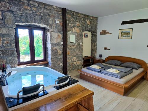 Postel nebo postele na pokoji v ubytování Casa Storia & Casa Antica