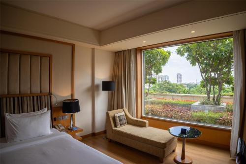 Postel nebo postele na pokoji v ubytování Radisson Blu Hotel, Nagpur